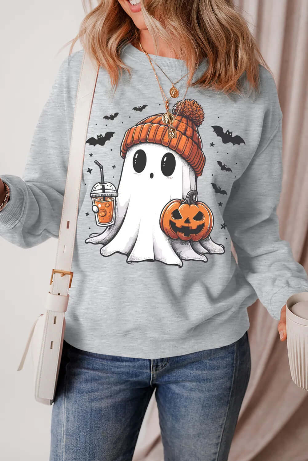 Seasonal & Holiday Apparel featuring a cozy Halloween sweatshirt with ghost design, perfect festive clothing for men and women.