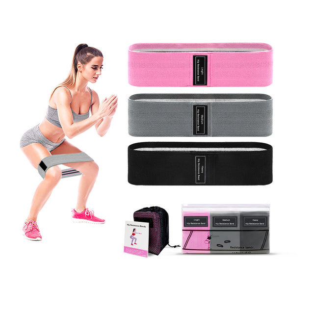 Fabric Resistance Bands by Vellmara featuring pink, grey, and black bands used for fitness training.
