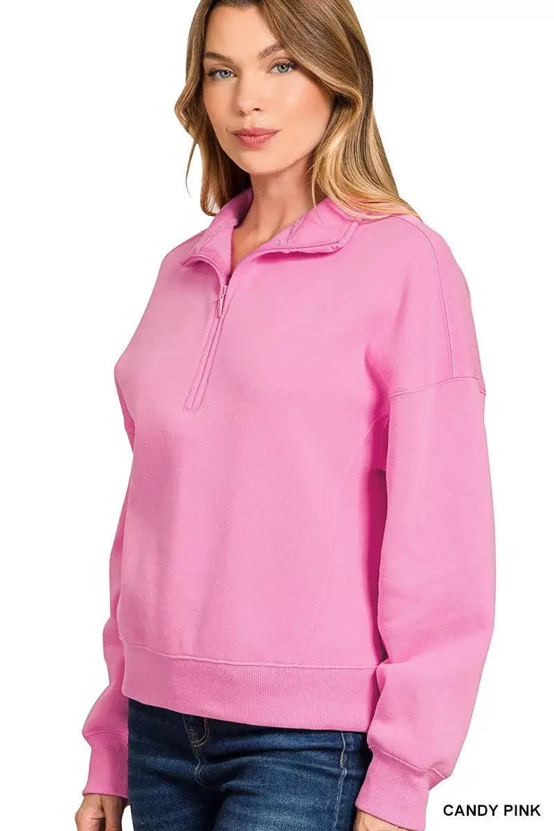 Zenana Fleece High Neck Half Zip Sweatshirt in candy pink worn by a model, perfect for cozy and stylish wear.