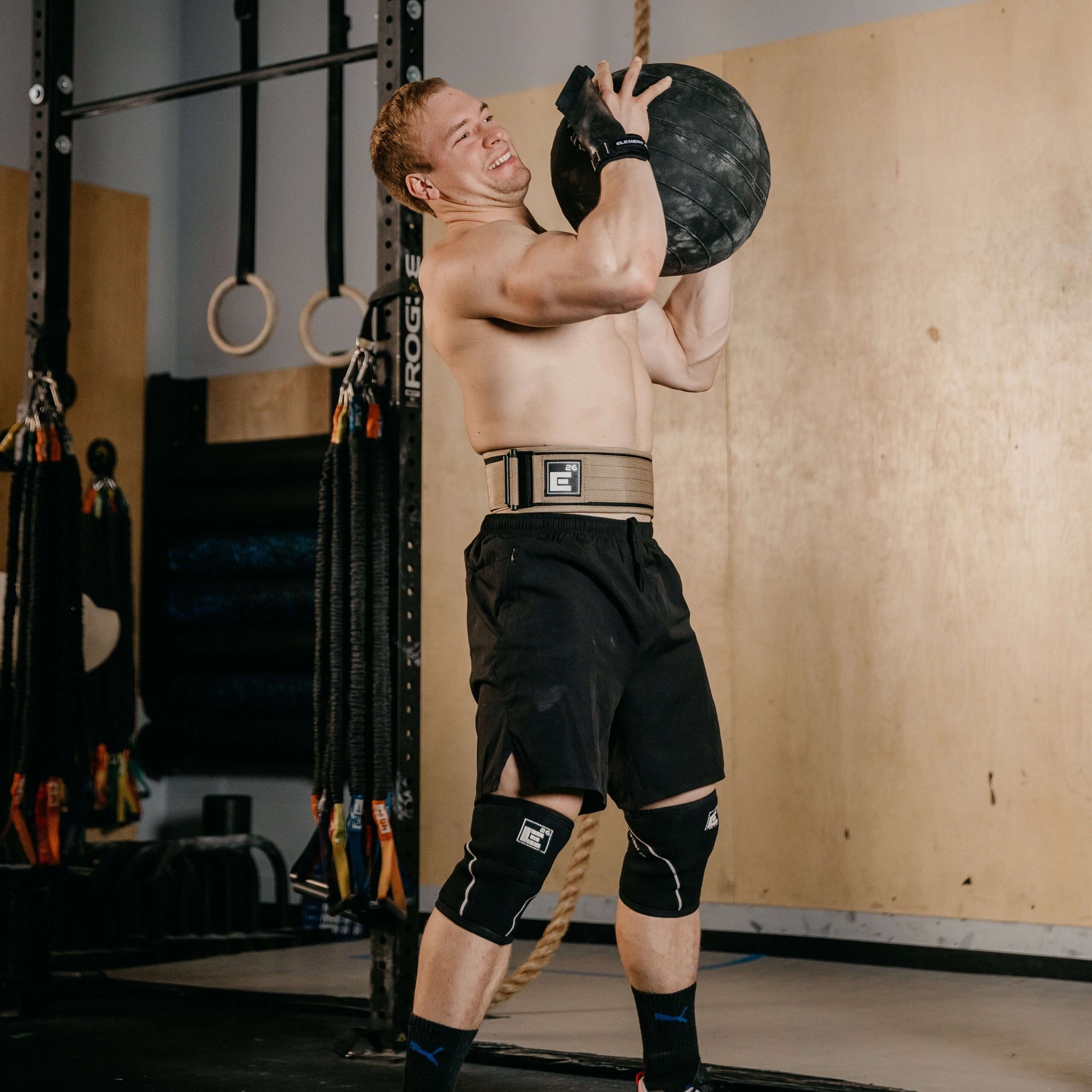 Athlete using a Self Locking Weightlifting Belt during a workout, highlighting stability and durability features.