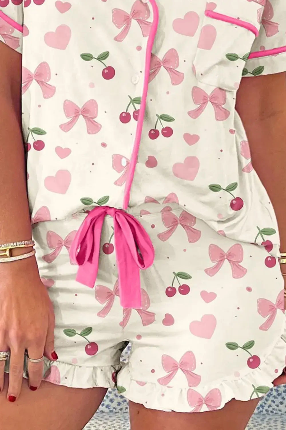 Floral Printed Button Up Short Sleeve Top and Shorts Lounge Set featuring pink bows and cherries.