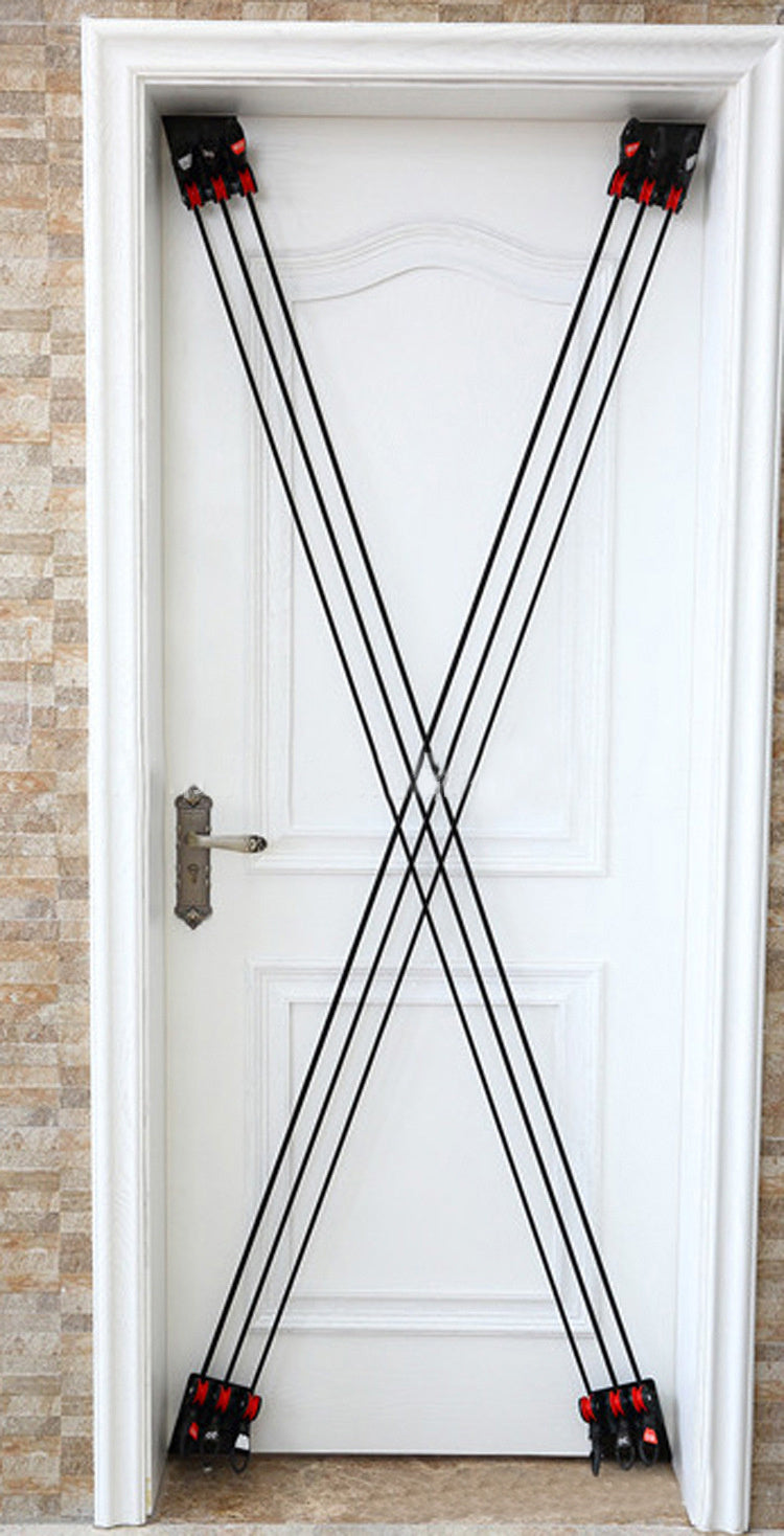 Home Fitness Door Unit Multi-function exercise equipment with pull ropes mounted on a door.