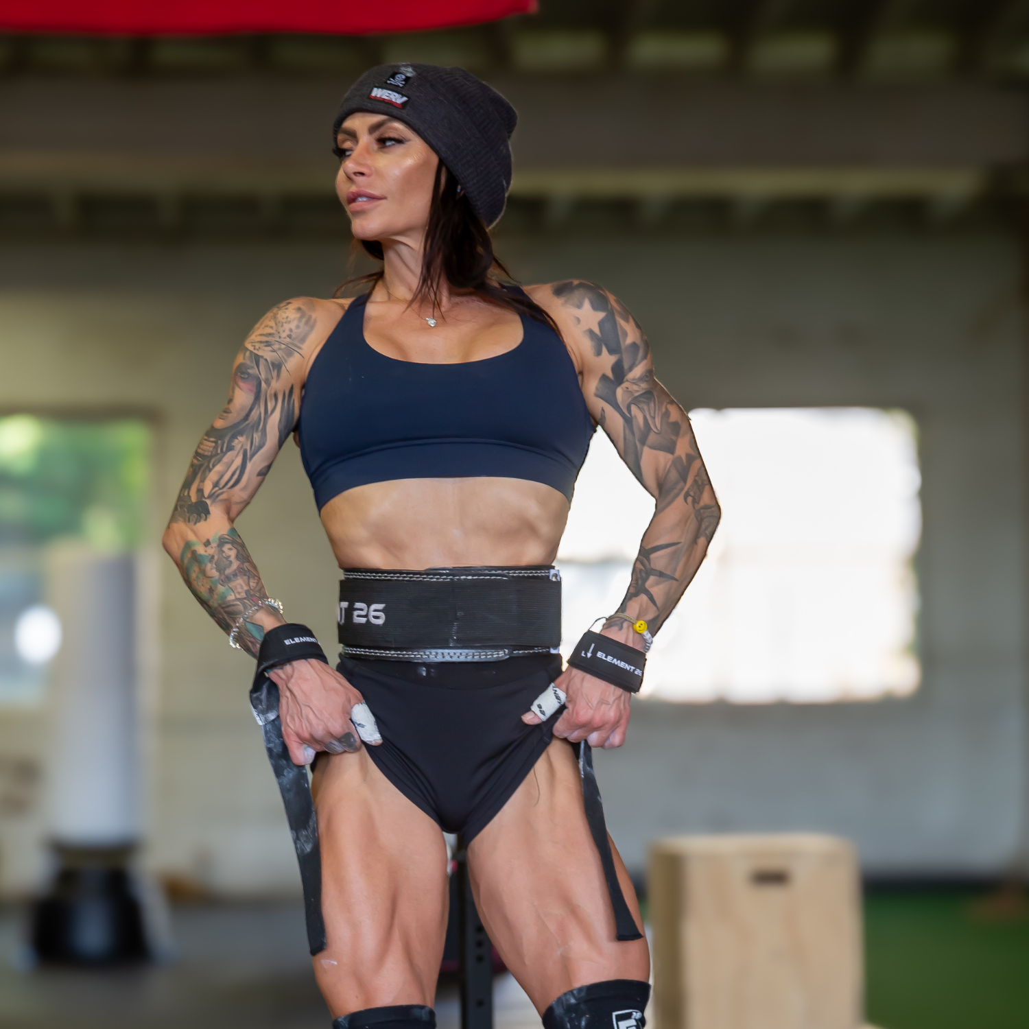 Athlete using Element 26 Weightlifting Tape for enhanced grip and control during workout.