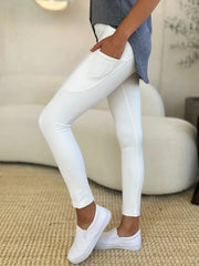 Wide Waistband Sports Leggings in white, featuring a sleek design and side pockets, styled with a casual gray top.