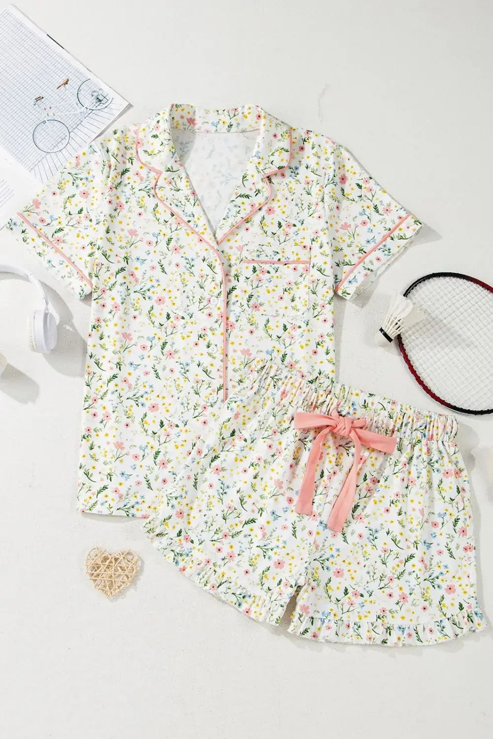 Floral Printed Button Up Short Sleeve Top and Shorts Lounge Set laid out with accessories.