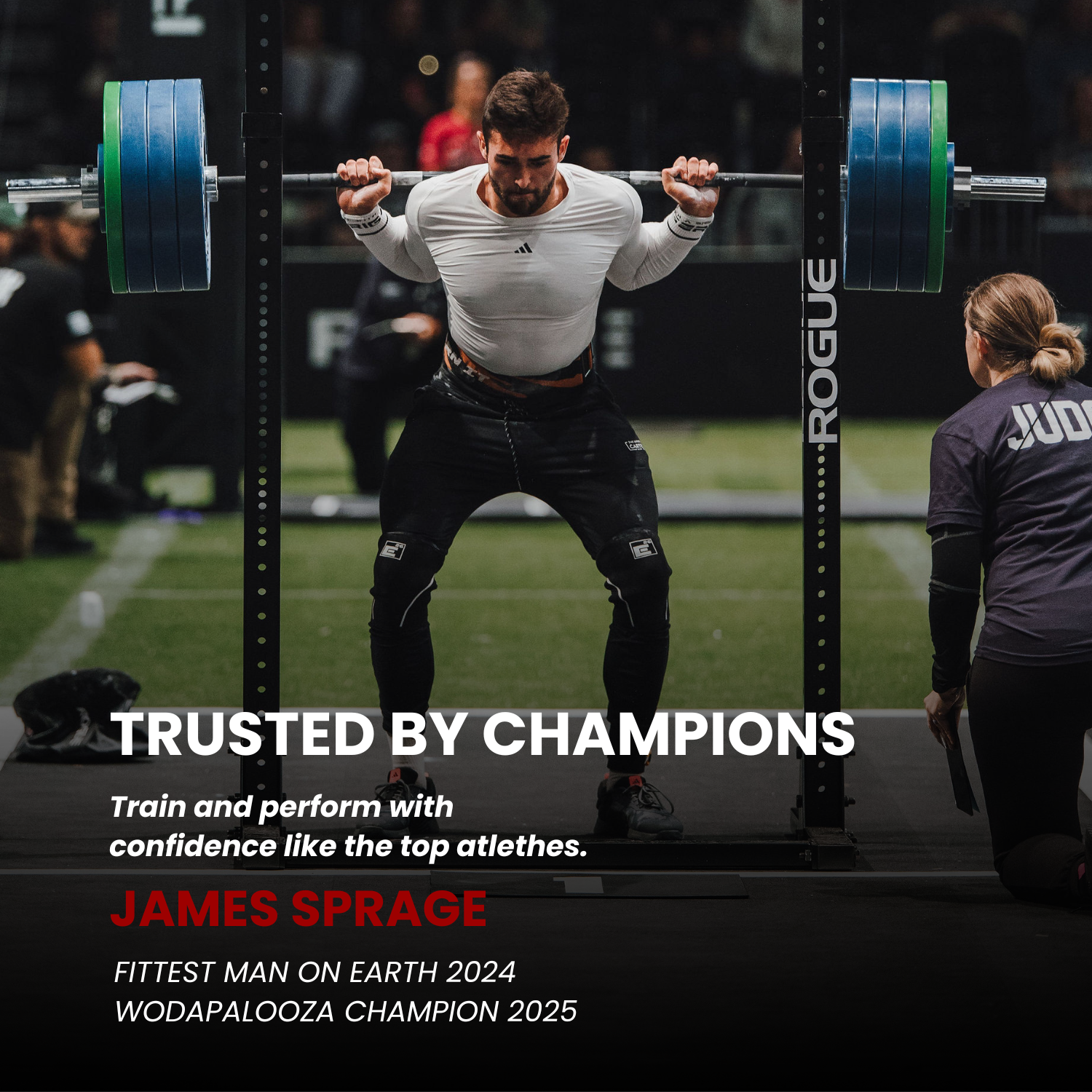 James Sprague performing weightlifting exercise at competition, showcasing strength and confidence.
