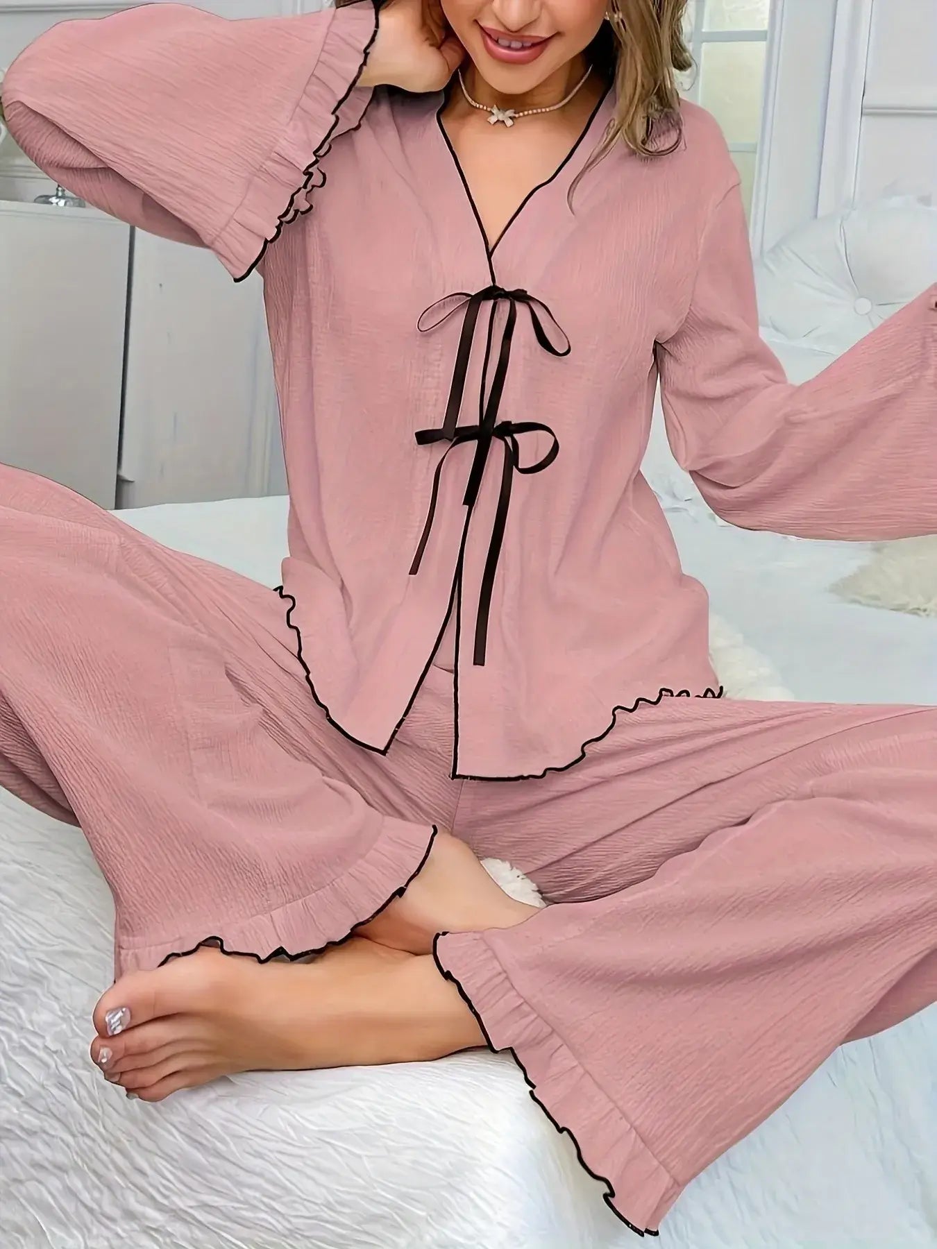 Frill Trim Bow Tie Shirt and Pants Lounge Set with frill details and tied bow in soft pink color.
