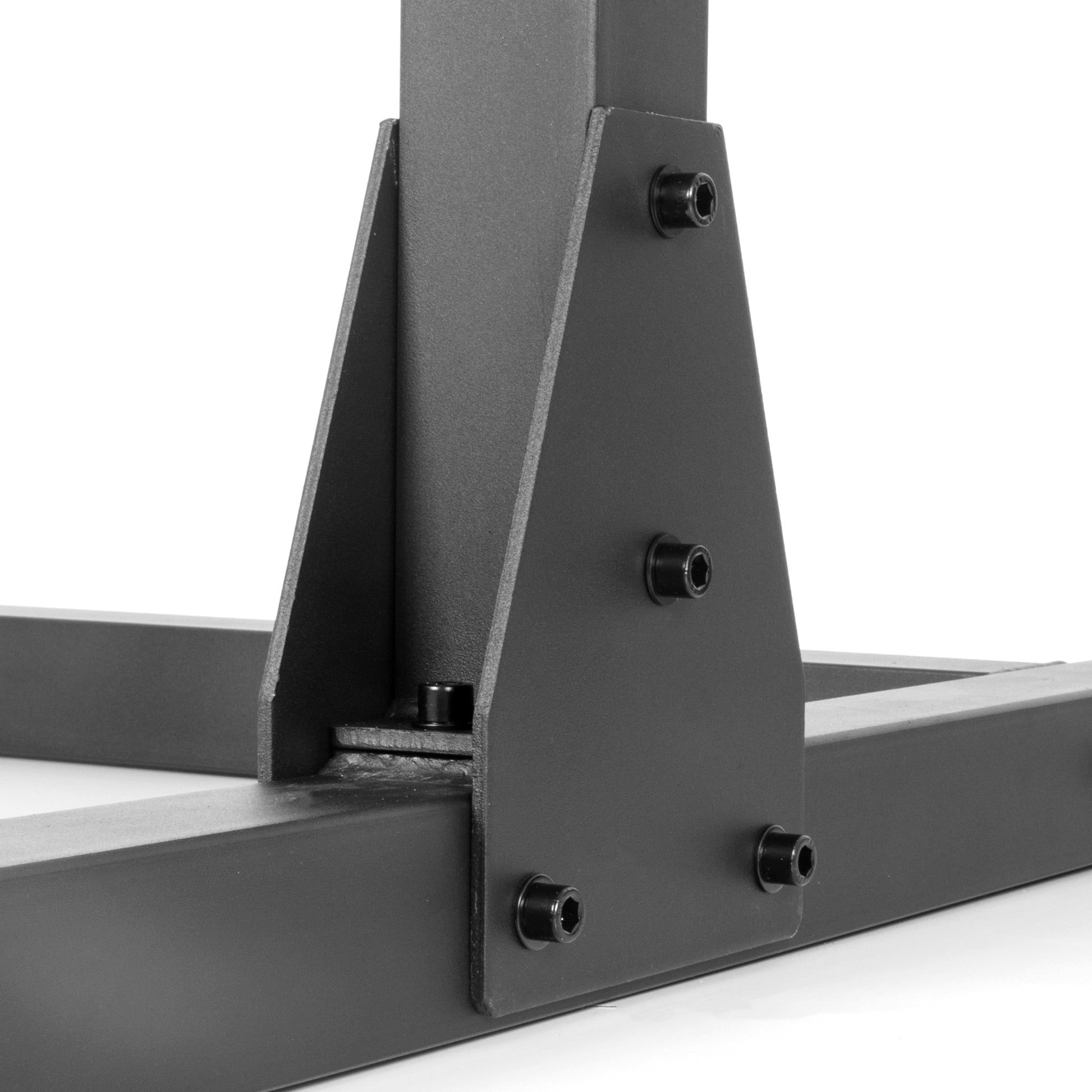 Close-up view of the sturdy base of the Squat Rack Bench Press with Adjustable Safety Spotters, showcasing its durable construction.