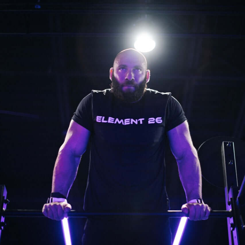 Man using Element 26 Vise Grips during workout to enhance performance and prevent hand tears.
