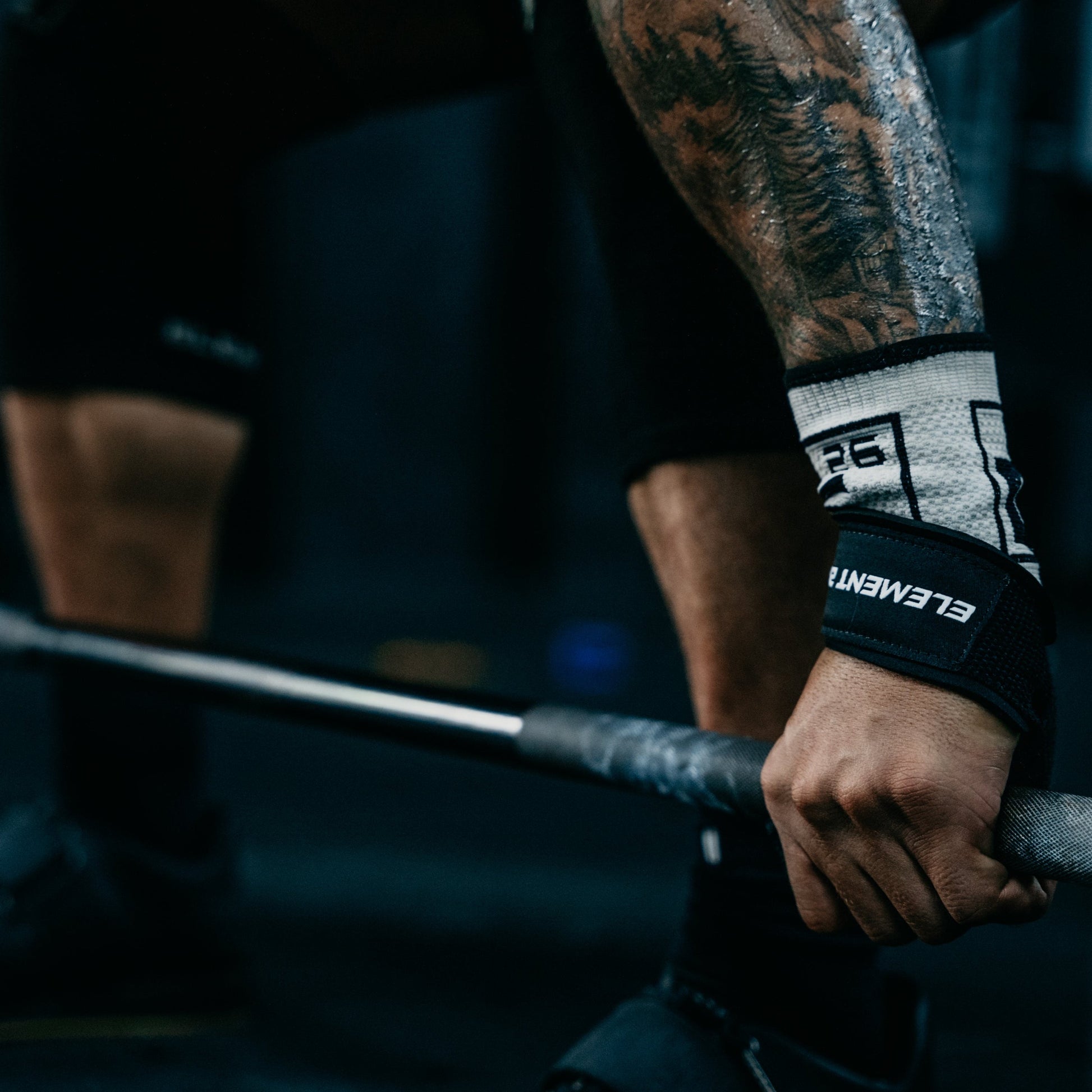 Weight Lifting Straps in use, featuring a strong grip around a barbell for enhanced lifting performance.