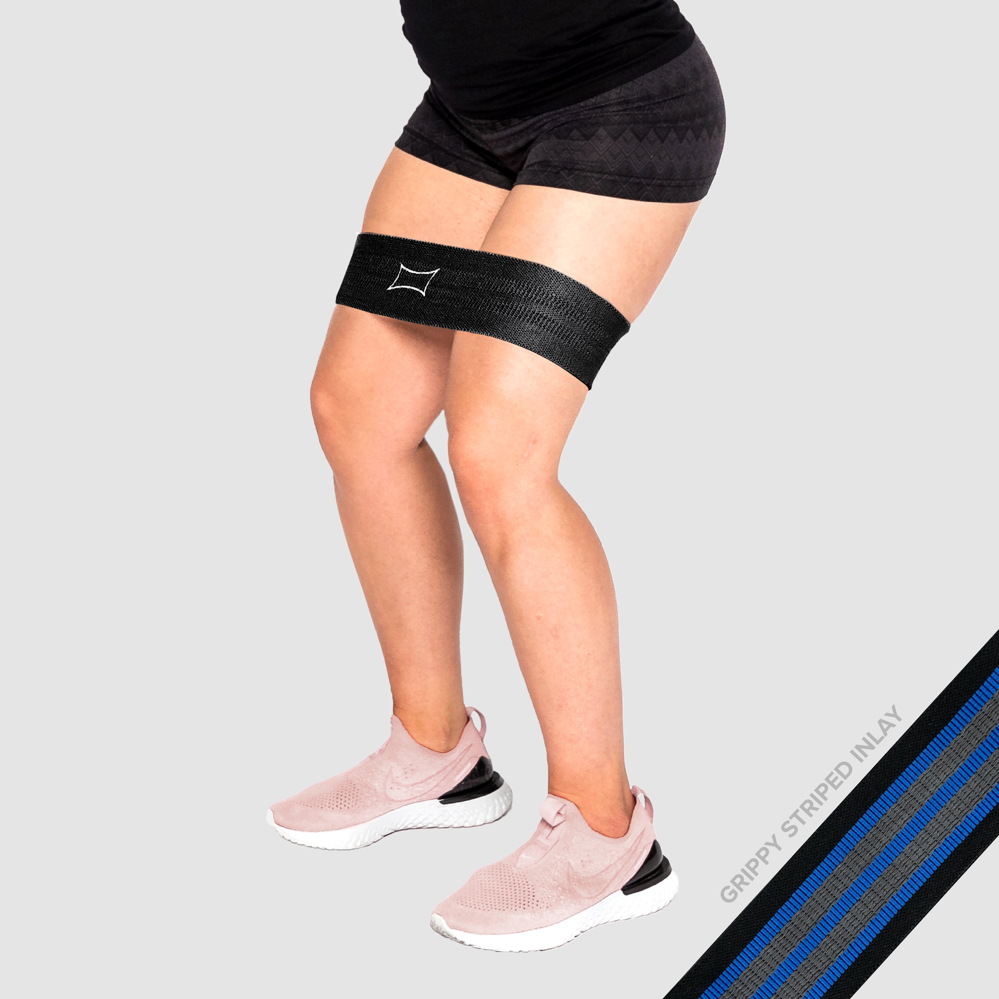 Person using Grippy Hip Circle Resistance Band for lower body workouts.