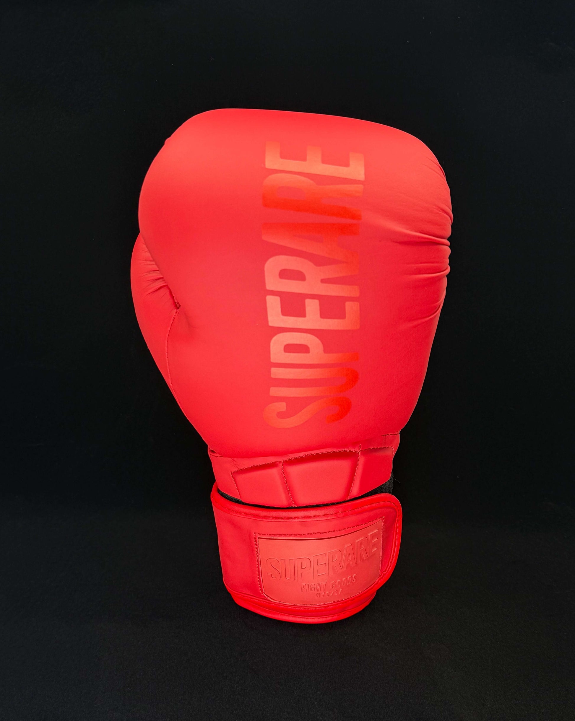 Superare Supergel V Boxing Gloves in vibrant red color, designed for traditional boxing, Muay Thai, and kickboxing.