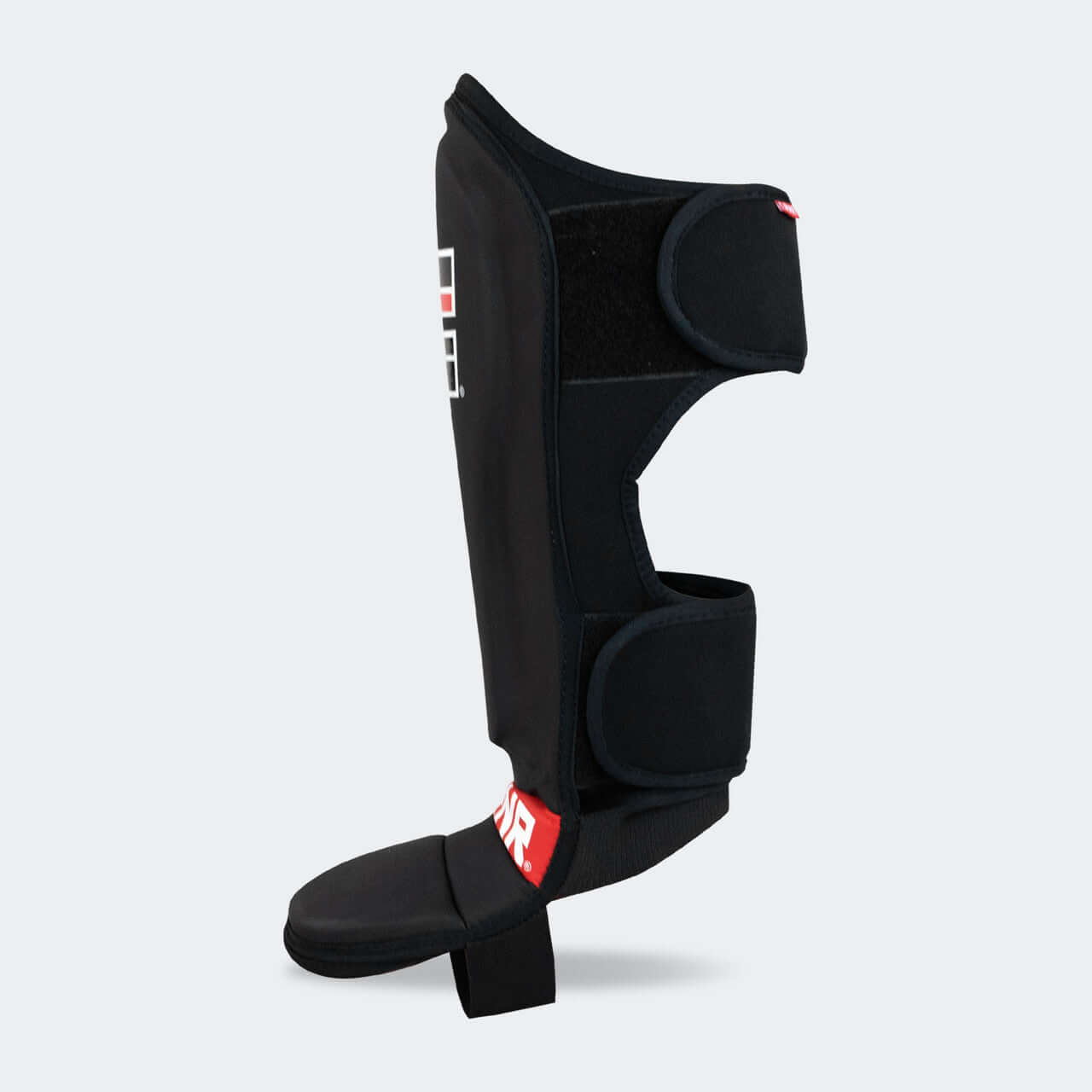 Kids MMA Spar Shin Guards by COMBAT CORNER side view, designed for child and youth fighters