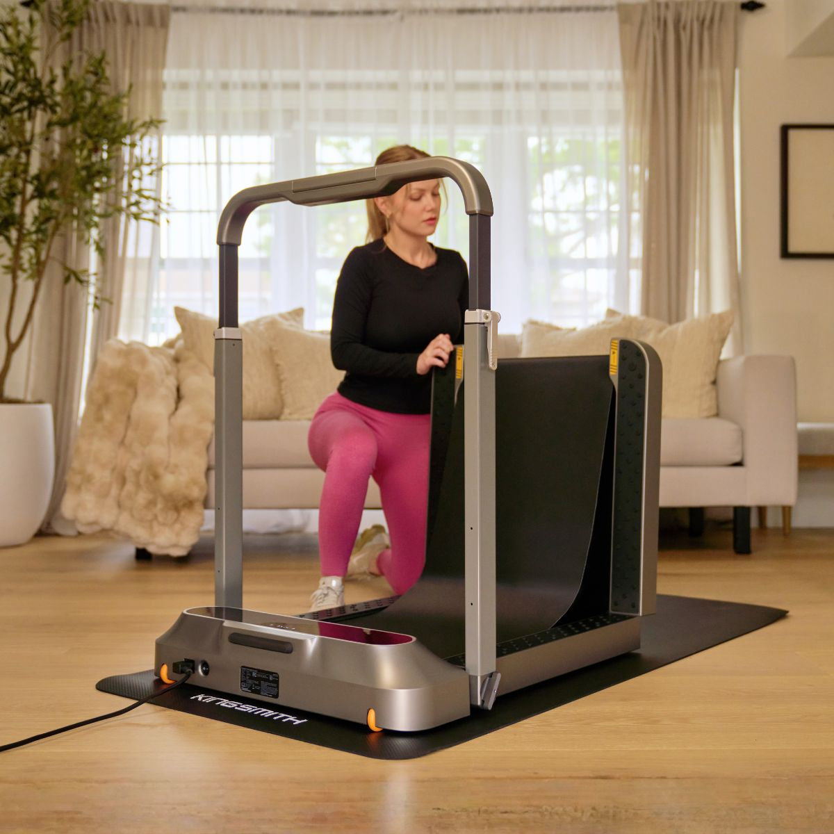 Walking Pad R2 Walk & Run 2IN1 Foldable Treadmill in a modern living room setup.