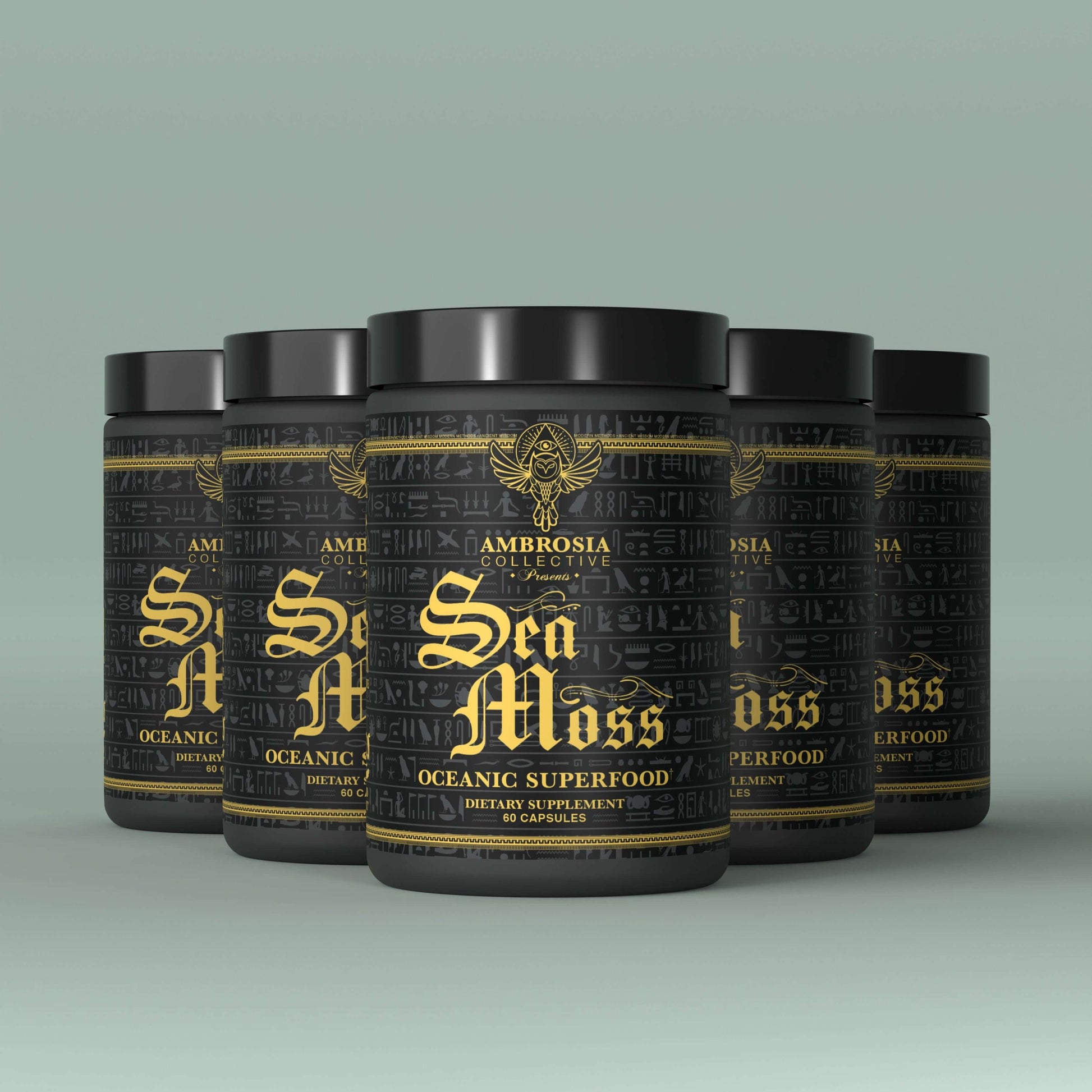 Sea Moss Super Food dietary supplement capsules in black containers on a light background.