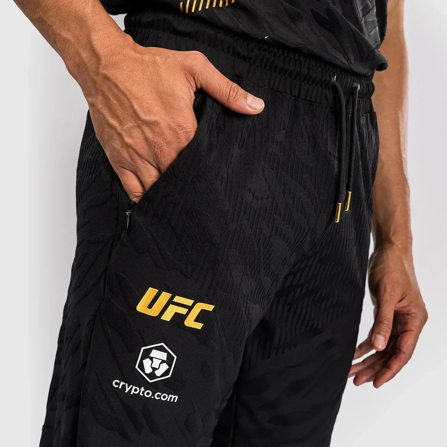 UFC Fusion Authentic Fight Night Walkout Joggers featuring a close-up of the side pocket and branding detail.