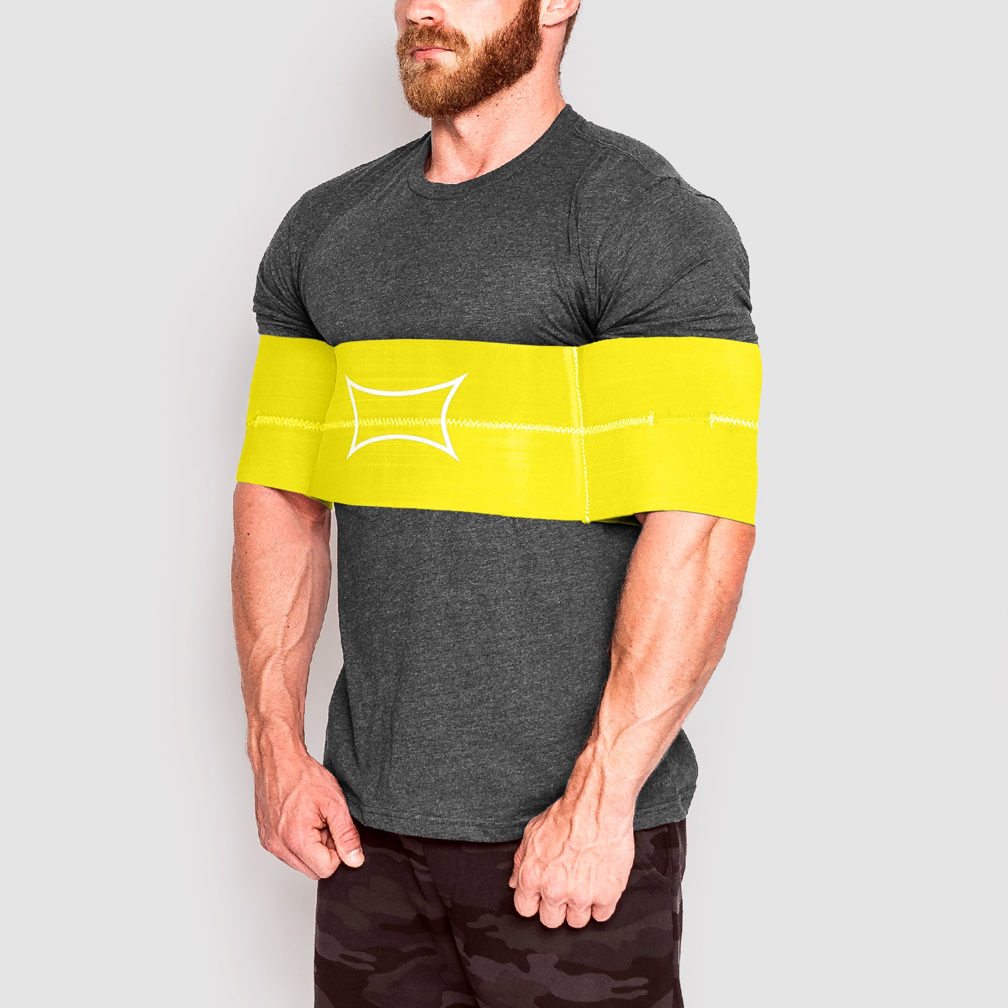 Man demonstrating the Full Boar Sling Shot® with angled sleeves for comfortable support during lifting.