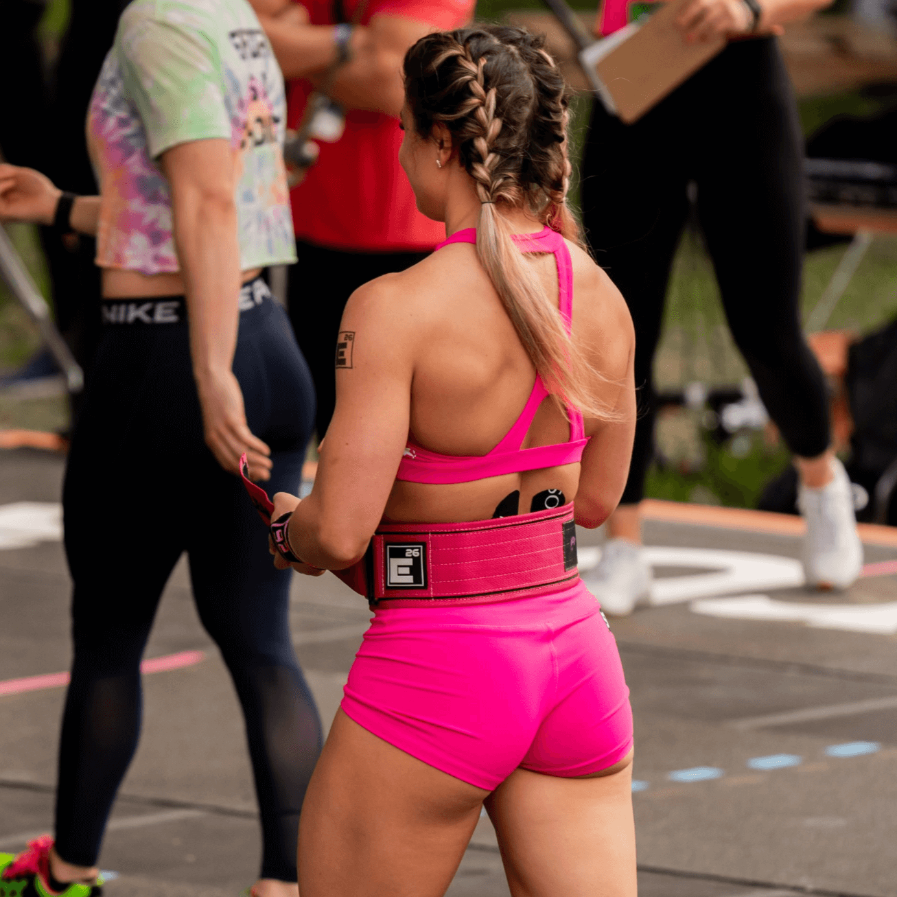 Athlete wearing a Self Locking Weightlifting Belt during a competition for optimal support and stability.