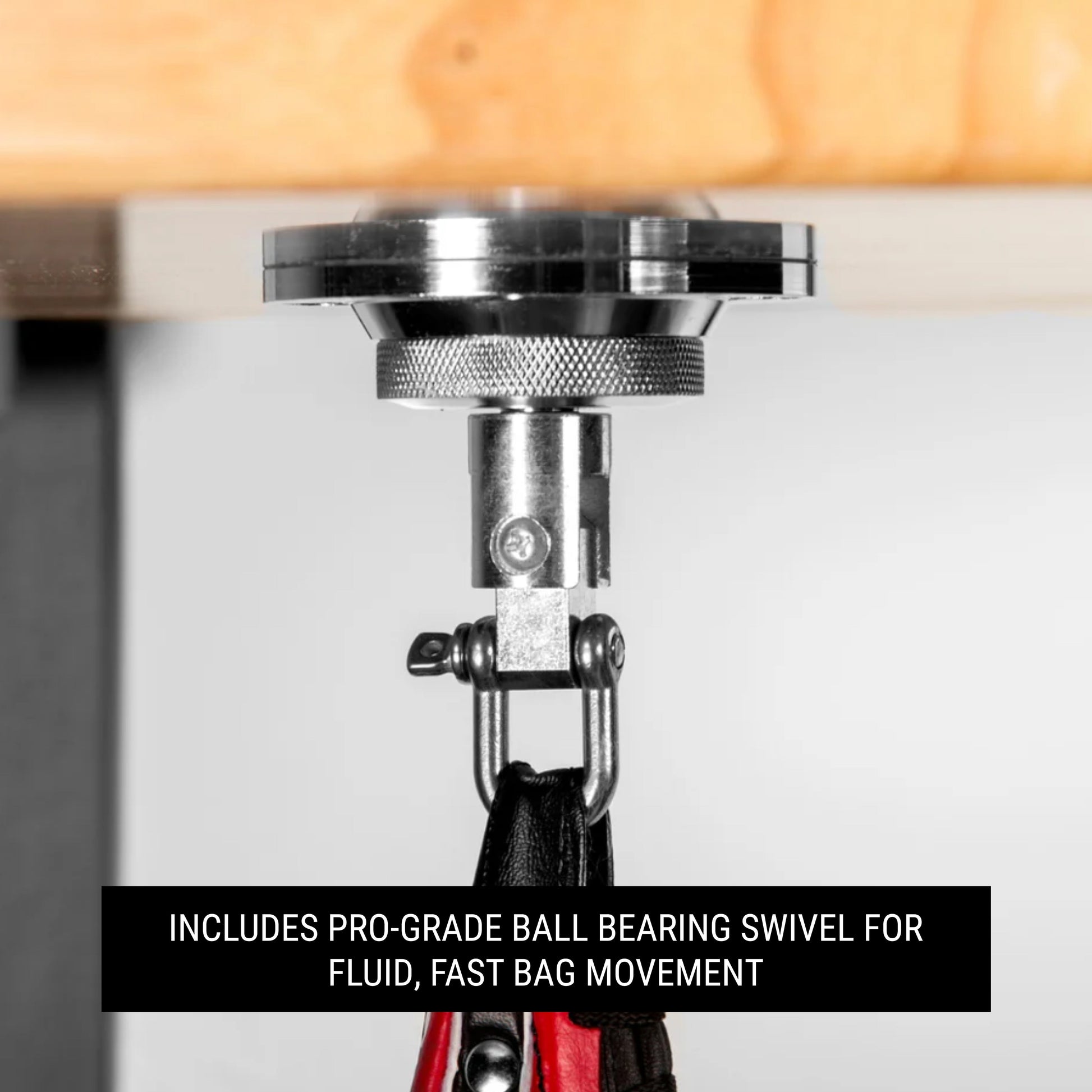 Wall Mounted Speed Bag Platform with Shackle Swivel showing pro-grade ball bearing swivel for fluid bag movement.