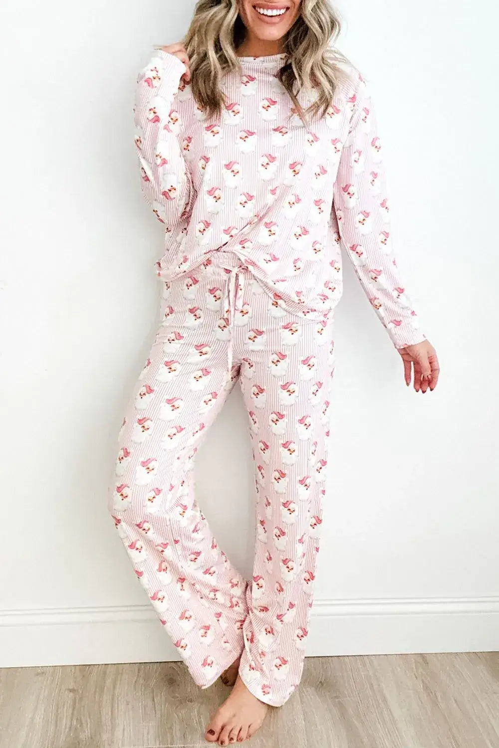 Model wearing Santa Print Long Sleeve Top and Pants Lounge Set with a joyful expression.