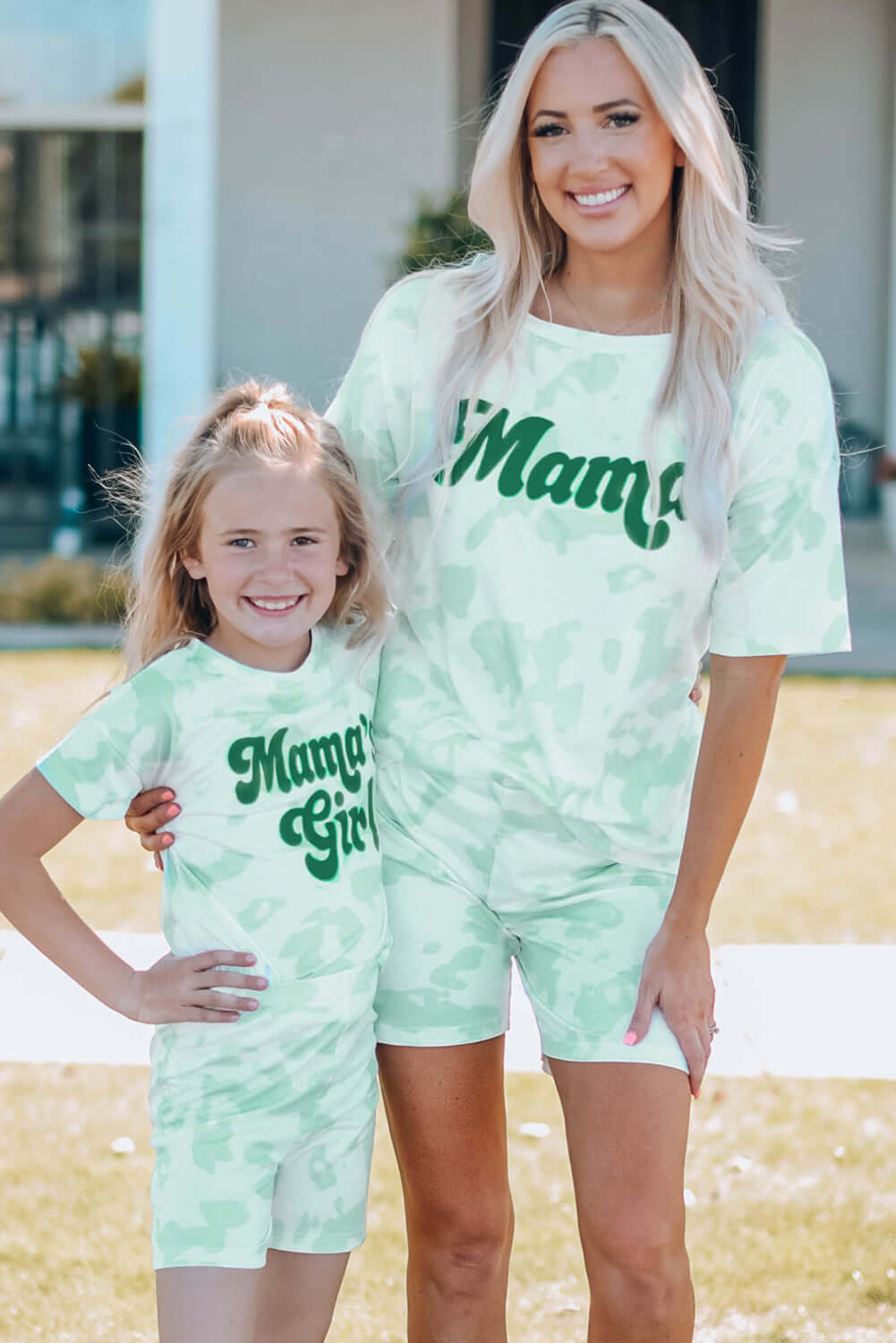 Mom and daughter wearing matching Girls Printed Letter Graphic Lounge Set, featuring vibrant green camo print.