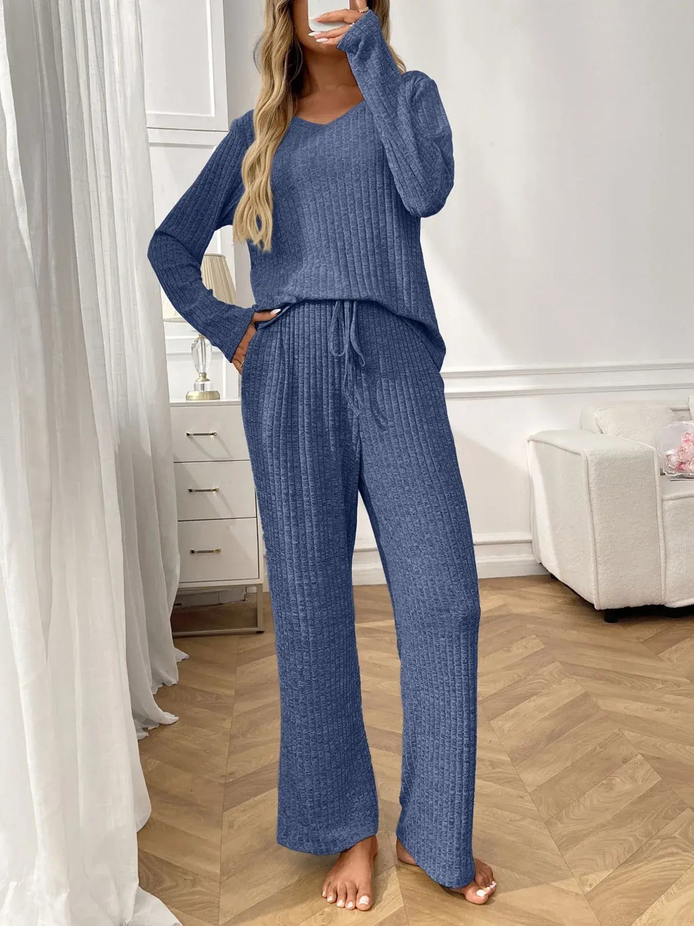 Ribbed Long Sleeve Top and Pants Lounge Set in blue, featuring a tied drawstring design and slightly stretchy fabric.