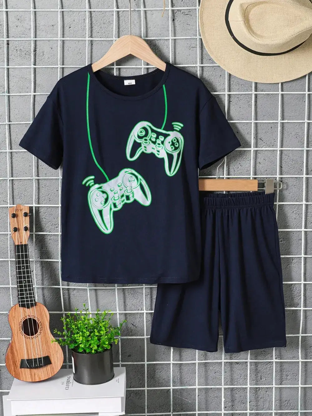 Children's Graphic Round Neck T-Shirt and Pants Set featuring gaming controller design on navy blue fabric.