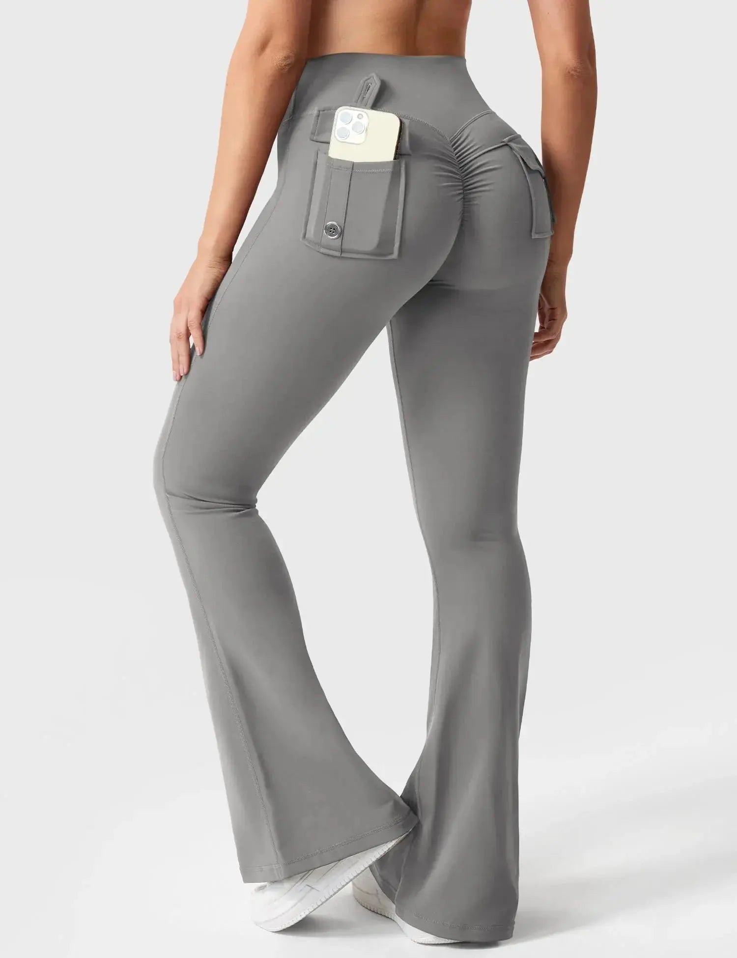 Flare Yoga Pants High Waisted Flairé with Pockets in grey, showcasing back view and functional pockets.