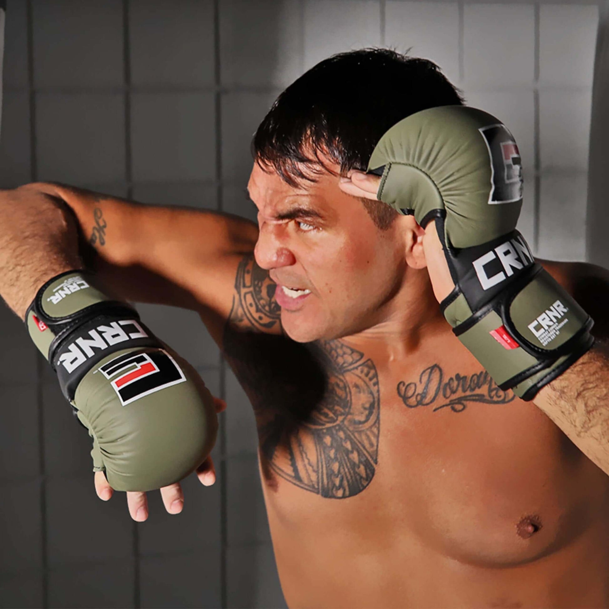 MMA SPAR GLOVES BY COMBAT CORNER being used by an athlete during training or sparring session.