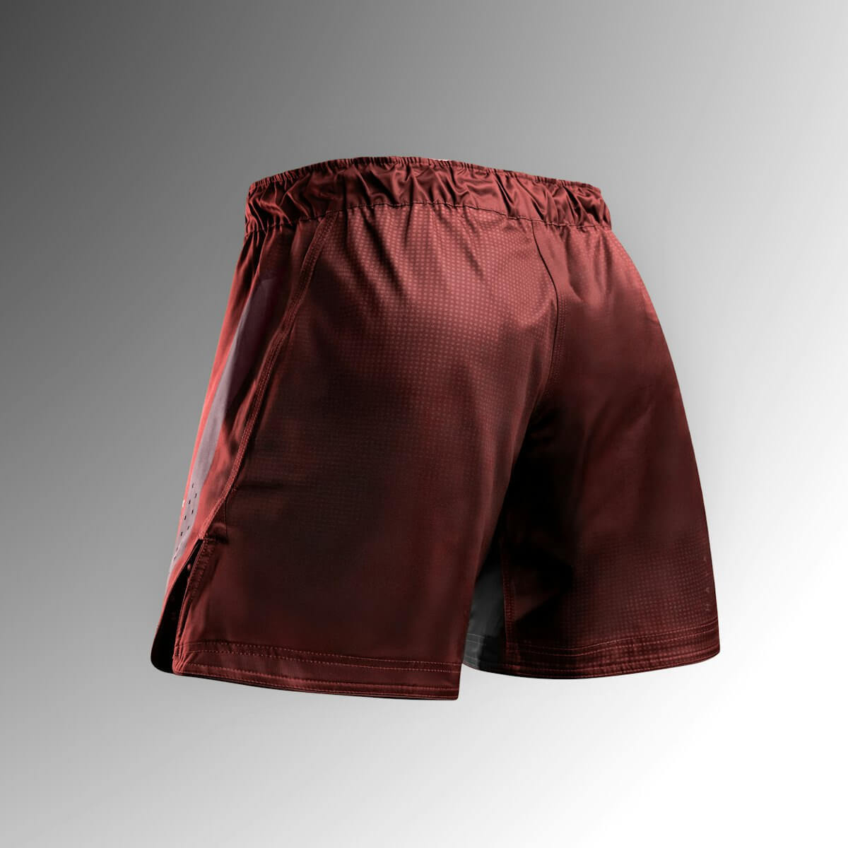 Hayabusa Core Mid-Thigh Fight Shorts in a deep red color showing the back view.