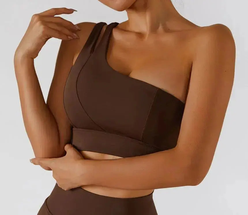One Shoulder Flaire Ribbed Workout Bra in brown, designed for comfort and style during workouts.