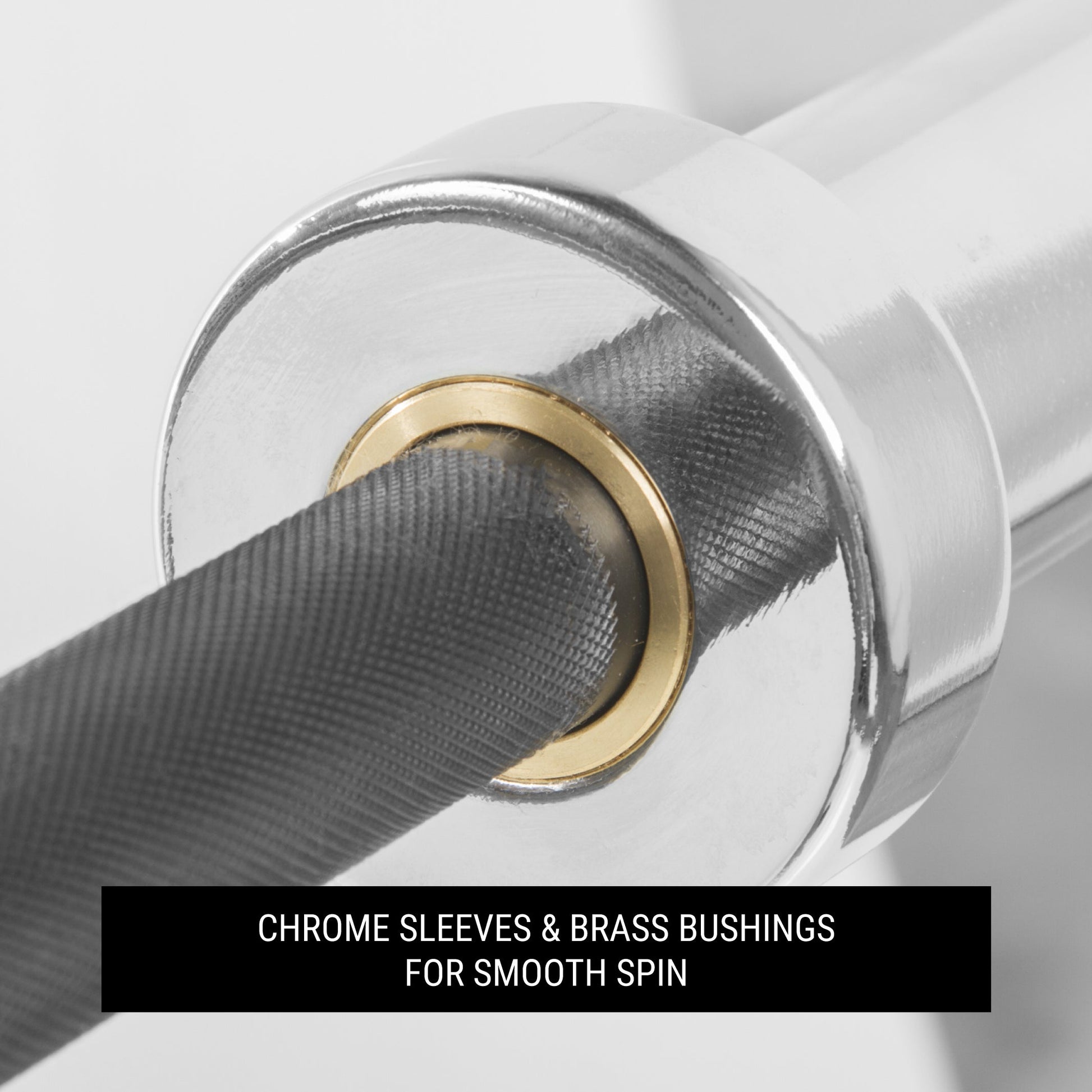 Close-up of chrome sleeves and brass bushings on the Lumberjack 7ft Olympic Beginner Bar for smooth spin.