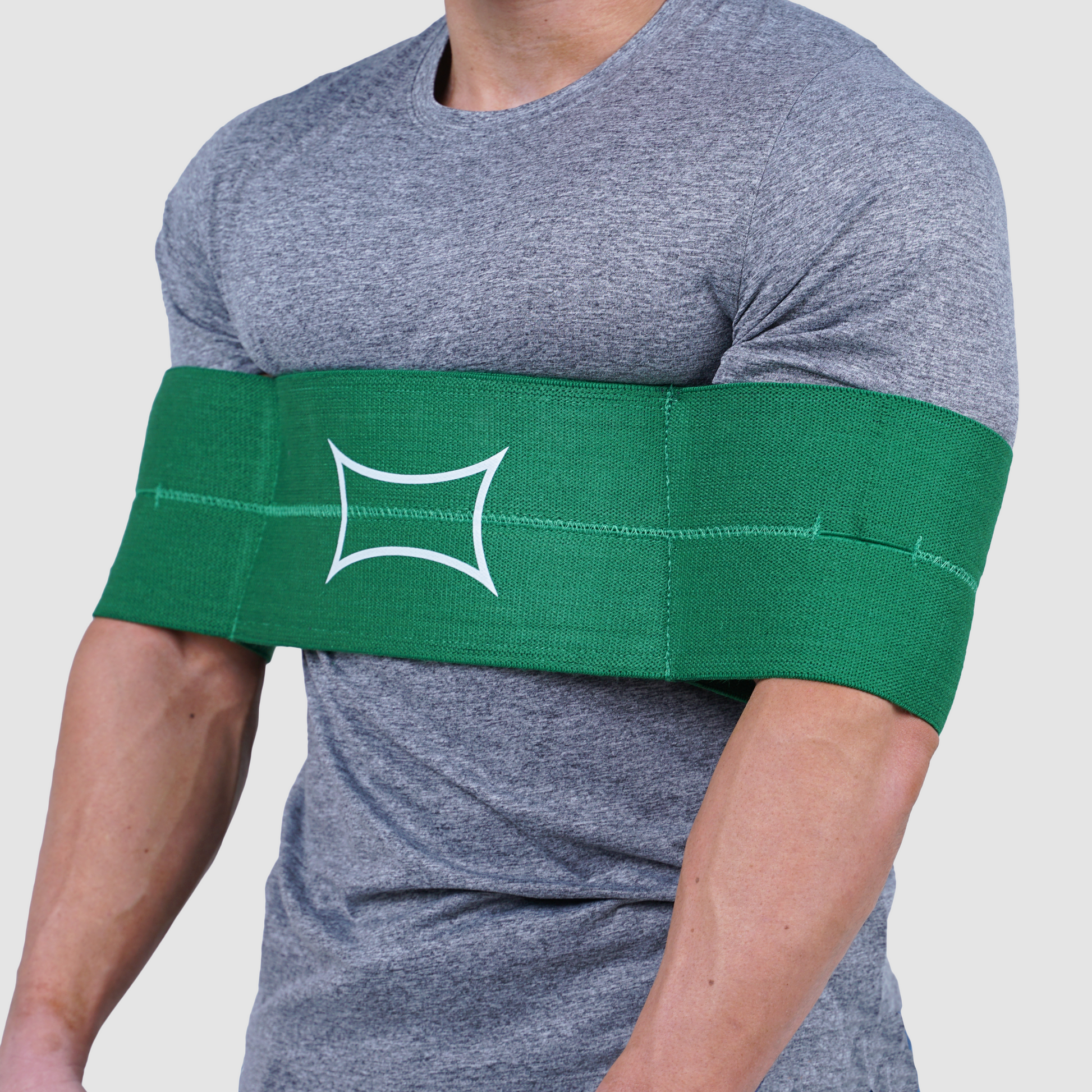 Money Shot Sling Shot worn by lifter demonstrating its comfortable fit and support for heavy bench press.
