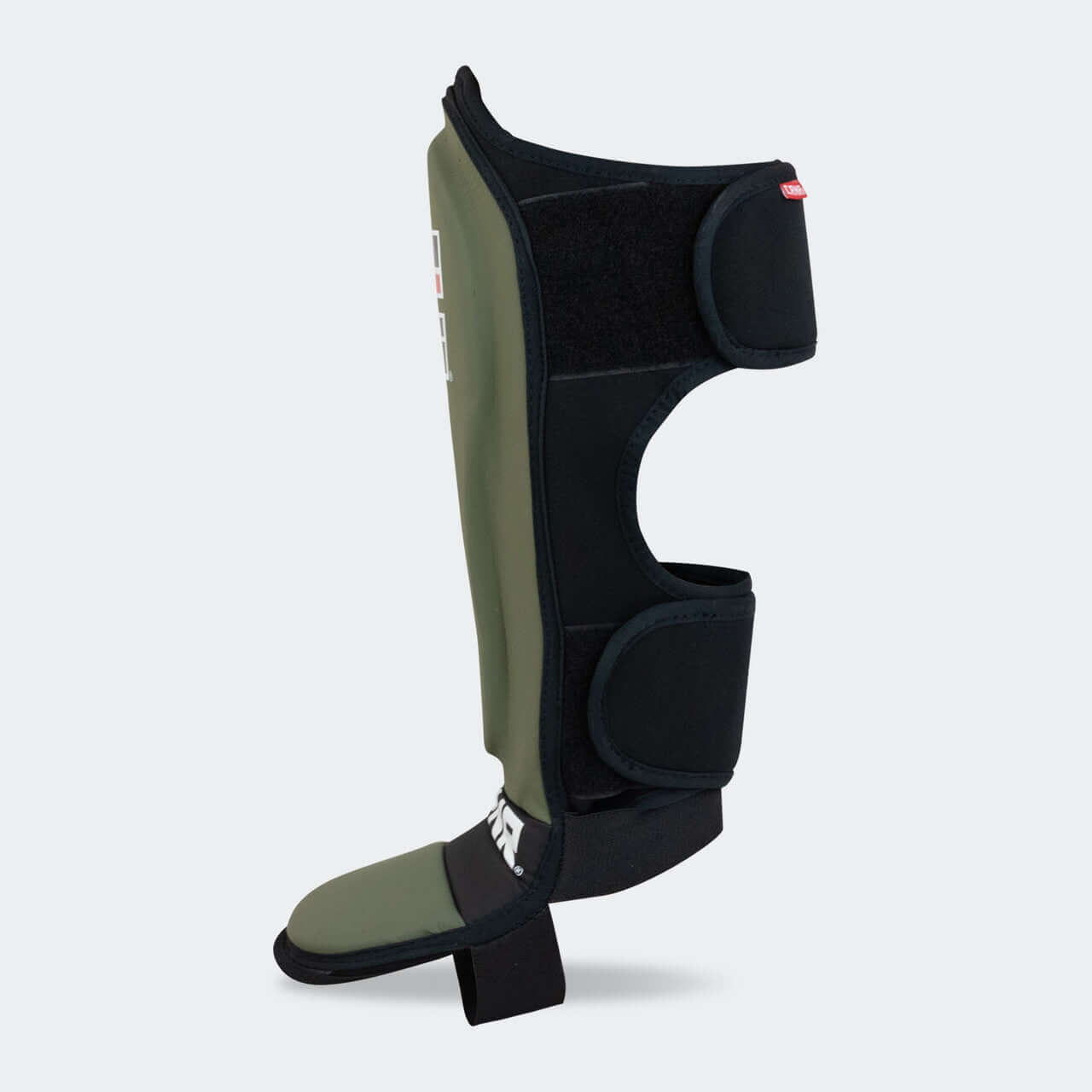 MMA SPAR SHIN GUARDS by Combat Corner side view showcasing the sleek design and protective features.