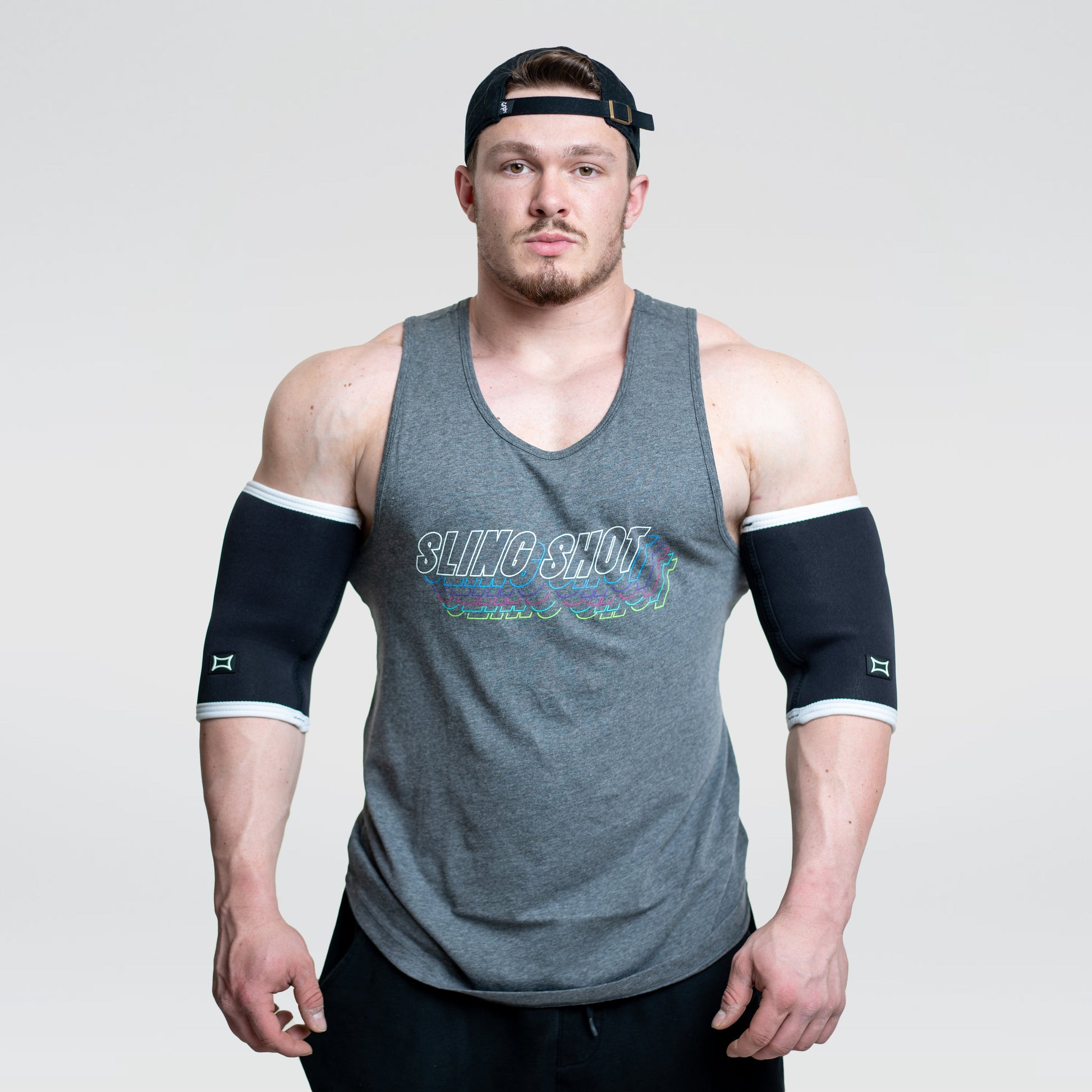 Athlete wearing Sling Shot Elbow Sleeves for optimal support and comfort during workouts.