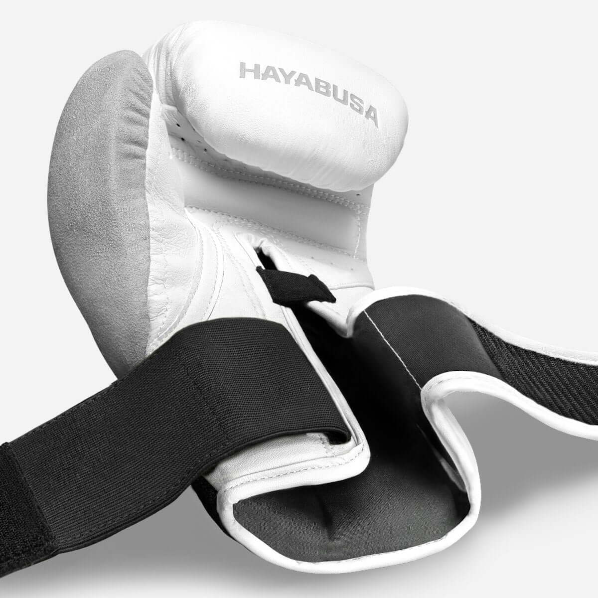 Hayabusa T3 Performance Boxing Gloves showcasing ergonomic design and interlocking straps for optimal support.