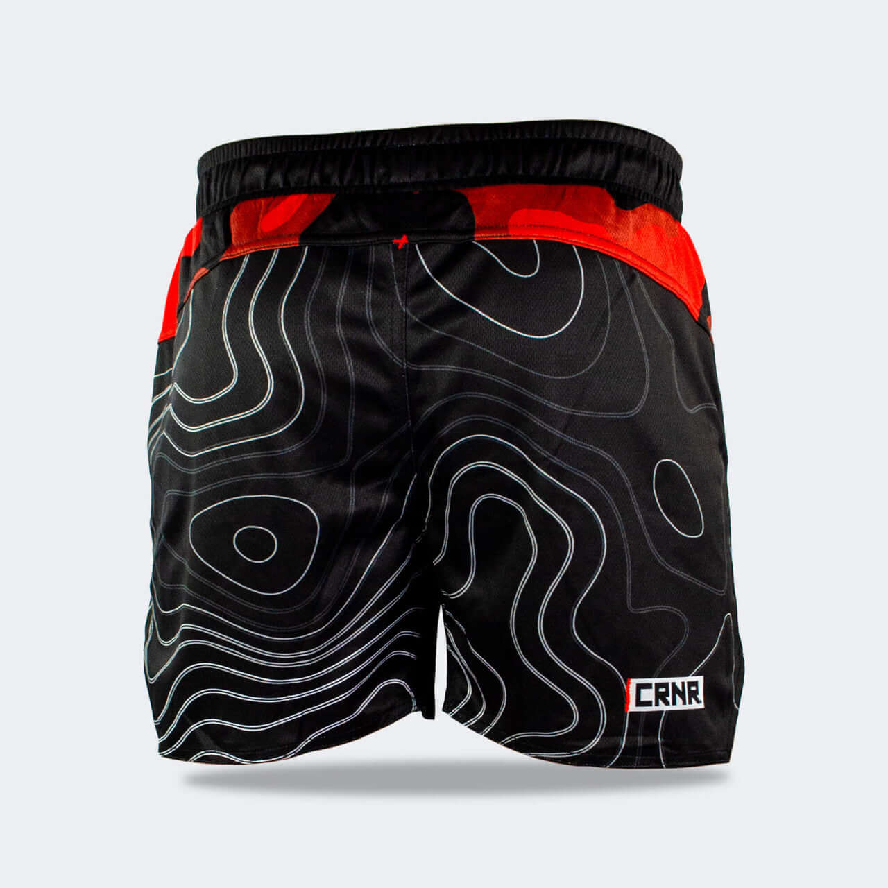 Back view of FORM TRAINING SHORTS by Combat Corner featuring a stylish black design with red accents.