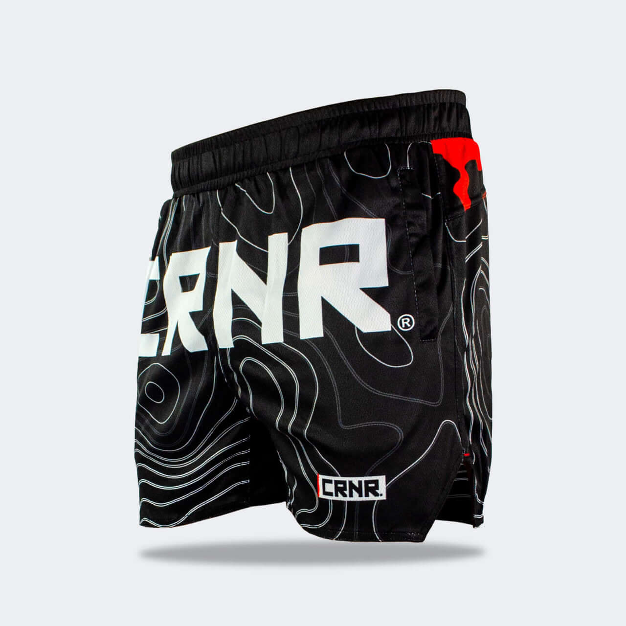 FORM TRAINING SHORTS by Combat Corner, featuring a bold CRNR logo and a stylish black design.