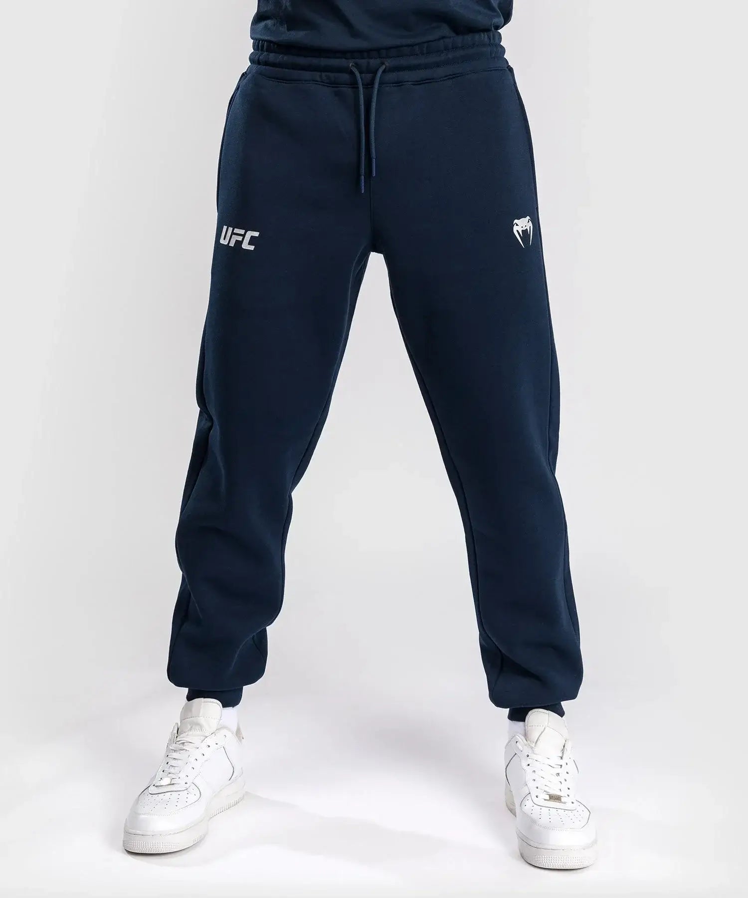 UFC Fusion Authentic Fight Week Cotton Joggers in navy color worn by a model, showcasing stylish athletic design.