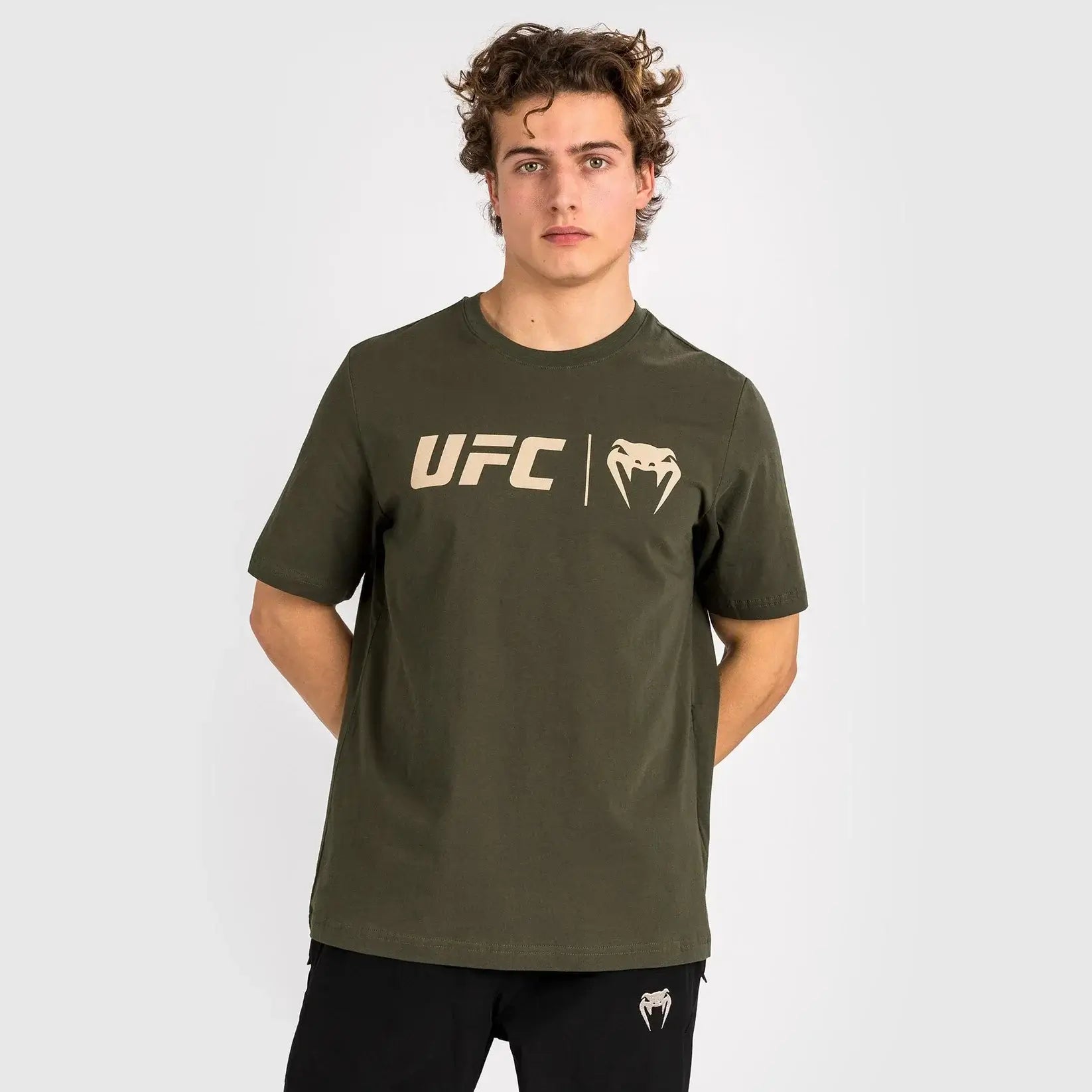 UFC Logo Classic Premium Cotton Tee displayed on a model, featuring tone-on-tone logos at the chest, perfect for gym or casual wear.
