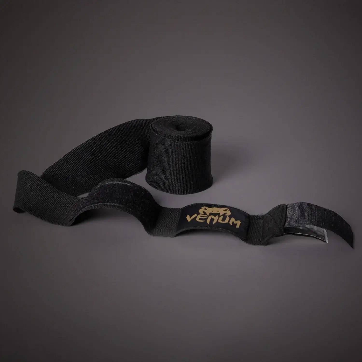 Venum Kontact Boxing Handwraps in black color, made from elasticated cotton for support and protection.
