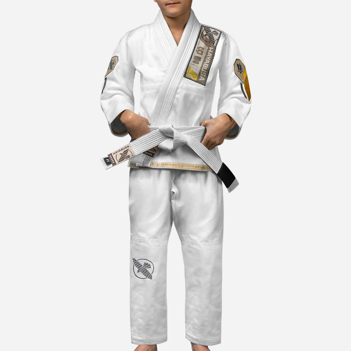 Hayabusa Ascend Youth Jiu Jitsu Gi displayed by a young practitioner, showcasing its quality and design.